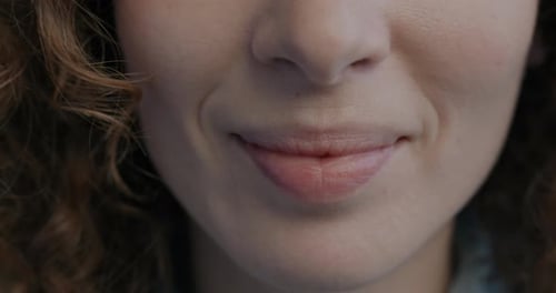 Woman's Mouth Opens in Extreme Close Up
