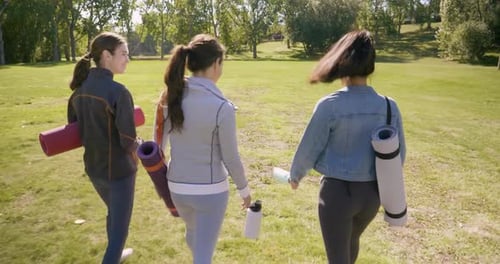 Yoga Friends Walk in Sunny Park