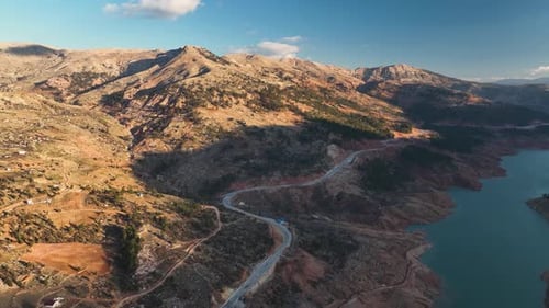 Beautiful Landscape of a Small Village on the Banks of a Mountain River