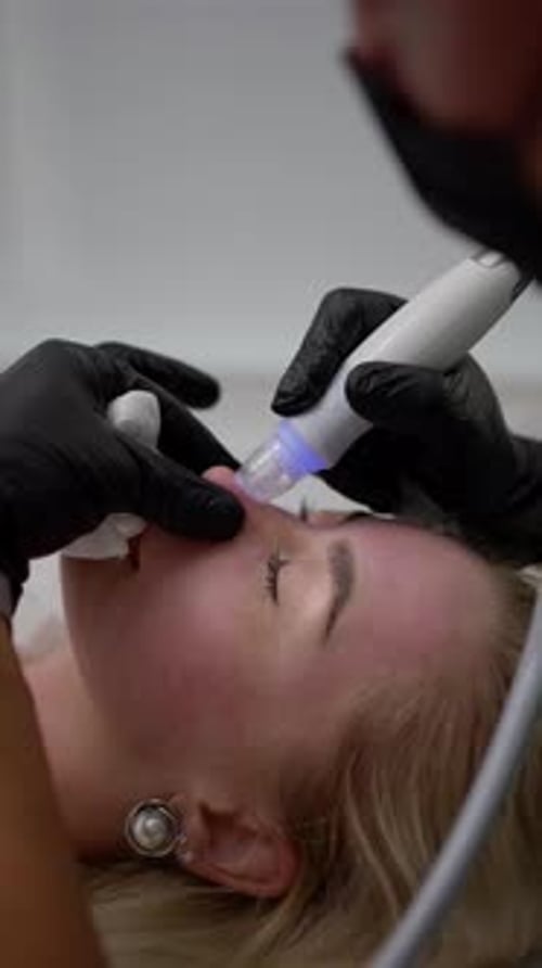 Woman Receiving Cosmetic Skin Treatment Close Up