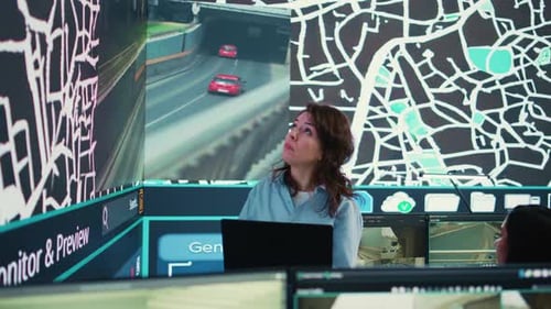 Woman Works in Futuristic Traffic Control Center