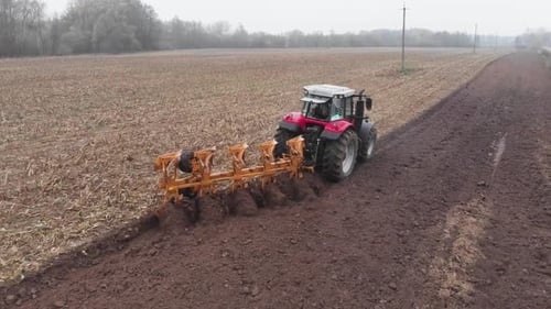 Tractor plowing the field in Ukraine