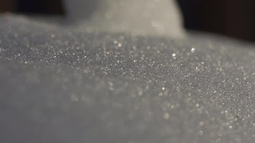 Macro Shot Of Ice And Snow Sparkling On Cold Winter Day In Bright Sunlight