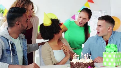 Corporate, Celebration and People Concept - Happy Office Team with Birtay Cake