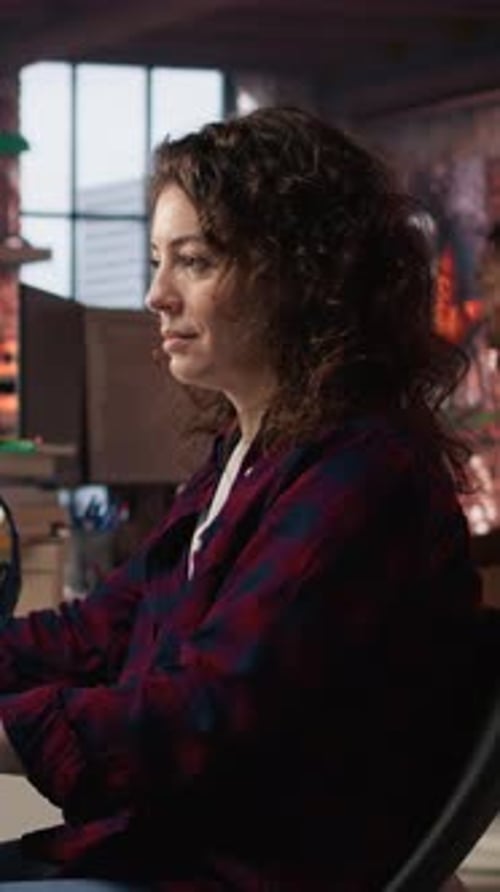 Vertical Video Smiling Woman Using Programming Languages on PC in IT Startup Office