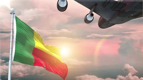 Benin Flag Waving and Airplane Flying Against Sunset Sky