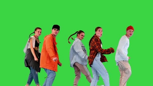Group of Young Hiphop Dancers Doing Moves in Sync on a Green Screen Chroma Key