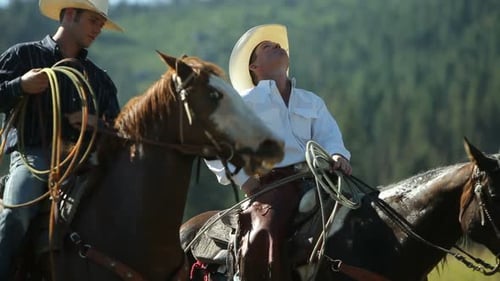 Vaqueros a caballo