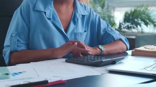 Close Up Hands Woman Accountant or Auditor Sits at Office Desk with Calculator