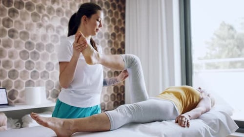 Senior Woman Having a Foot Massage in Resort