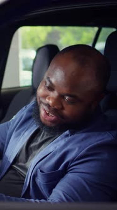 Vertical Video Man Doing Test Drive Examining Car Before Making Purchase