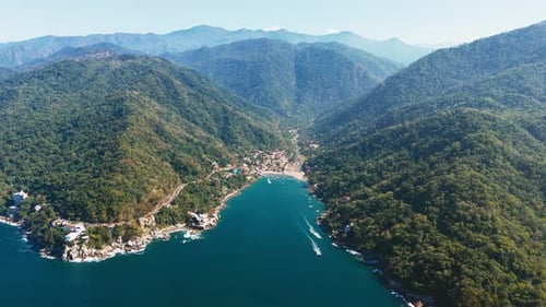 Aerial view of boca de tomatlan surrounded by mountains in puerto vallarta mexico