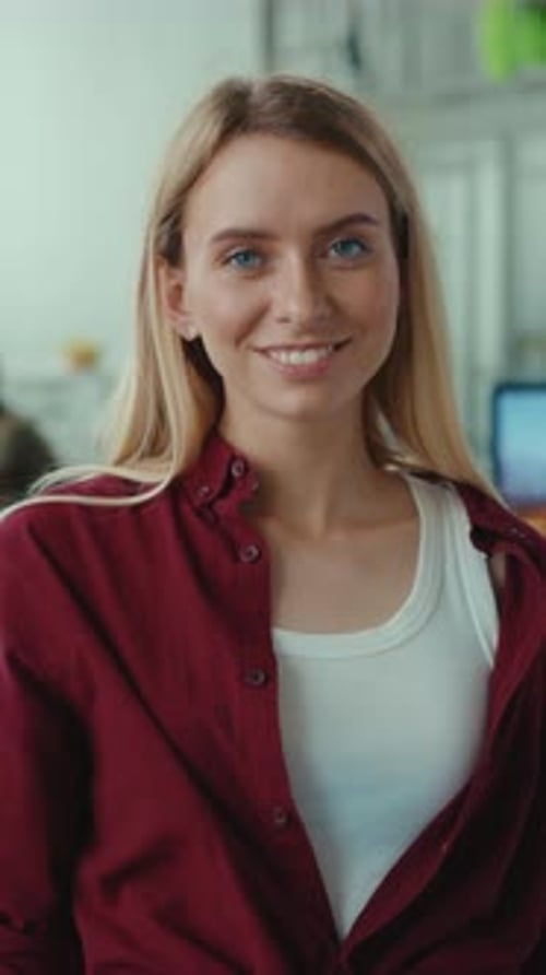 Woman Smiling in an Office Close Up