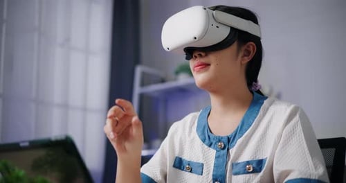 Young Adult Using Virtual Reality Headset at Home