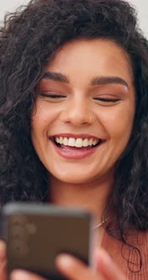 Phone, happy and businesswoman in office with texting, networking or communication on mobile app