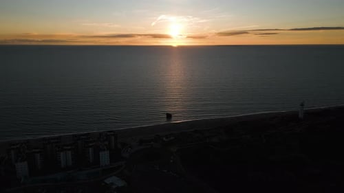 Vibrant sunset over seascape near Spain coast, aerial view