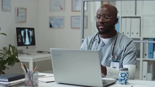 Doctor Discussing Treatment Via Telehealth