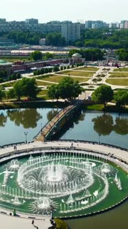 Top View of Fountain in Pond and Historical Palace Creative Amazing Fountain in Lake with Pedestrian