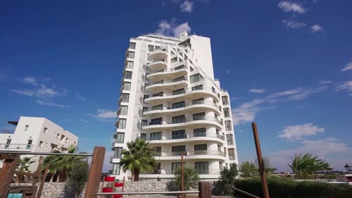 Modern Luxury Beachfront Condo Showcased for Real Estate Investment Opportunities with Panoramic