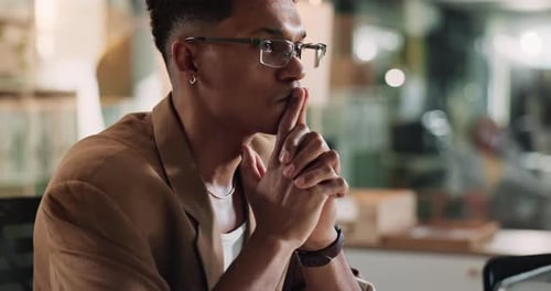 Man, laptop and thinking for ideas, office or work for creativity at digital agency as art director