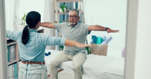 Senior Man Stretching with Physical Therapist