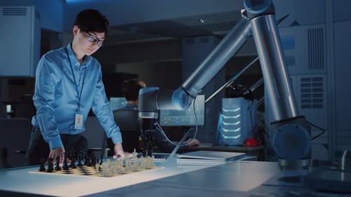 Professional Japanese Development Engineer is Testing an Artificial Intelligence Interface by Playi