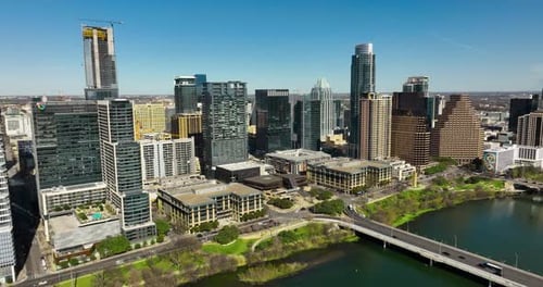 Aerial shot of downtown Austin, TX with the Colorado River in frame