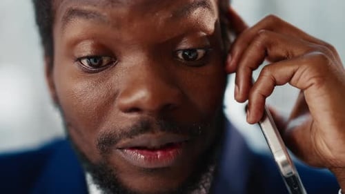 Man in Suit on Cell Phone Close Up