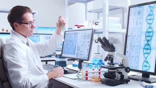 Scientist Examining Test Tube in Modern Laboratory