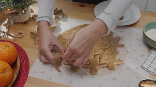 Woman Prepares Christmas Gingerbread Cookies at Home