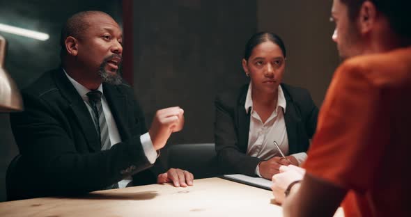 Lawyer, talking and criminal client in interrogation room for ...