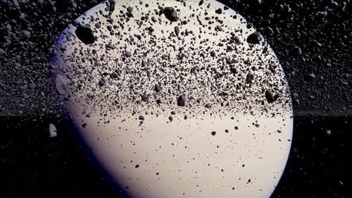 Stunning View of Saturn Surrounded By a Ring of Cosmic Debris