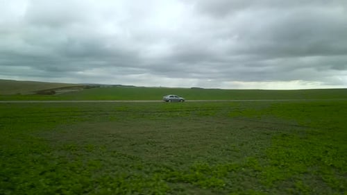 Green canola field aerial view in Ukraine