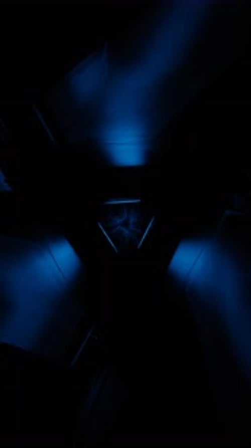 Vertical Video of Geometric Neon Patterns with Rhythmic Light Pulses