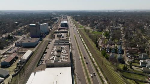 Aerial view of industrial district on sunny day