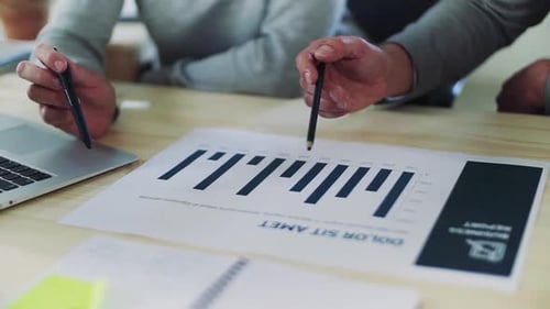 A Midsection of Businessman and Businesswoman Working Together in Office, Talking