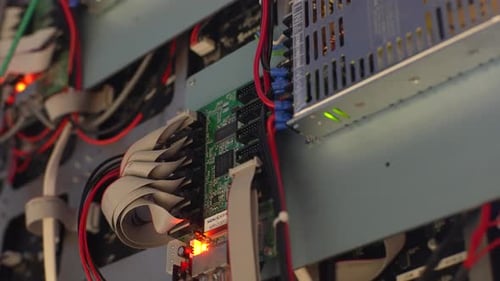 Closeup Tracking Shot of Modern Technology Hardware Room of Manufacturing Plant with Server Blocks