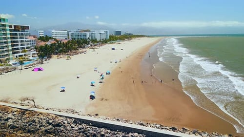 Tourists Enjoying Nuevo Vallarta Beach In Riviera Nayarit, Mexico
