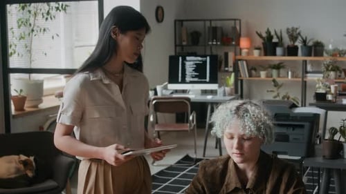 Young Project Manager Talking to Colleague, then Walking to Office Workplace
