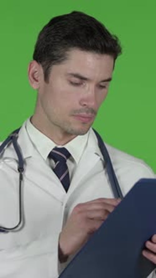 Doctor going through Checklist Documents, Chroma Key, vertical video