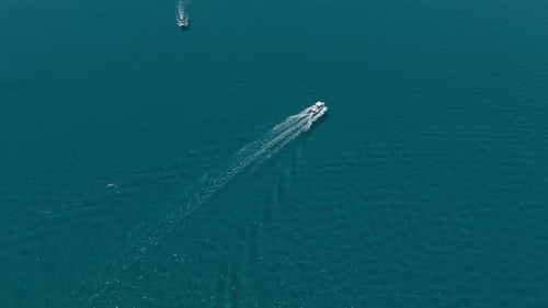 Speedboats Cruising on Turquoise Ocean Water
