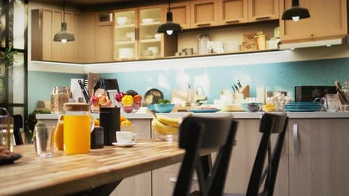 Modern Kitchen Interior with Wooden Table and Fruit