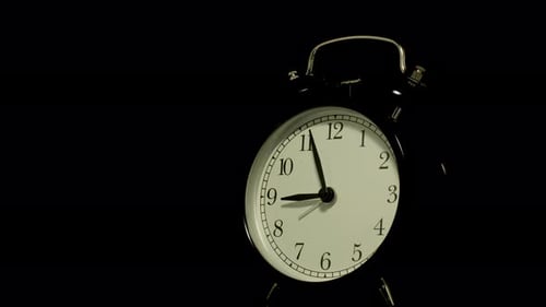 Alarm Clock Hands Move Backwards in Time