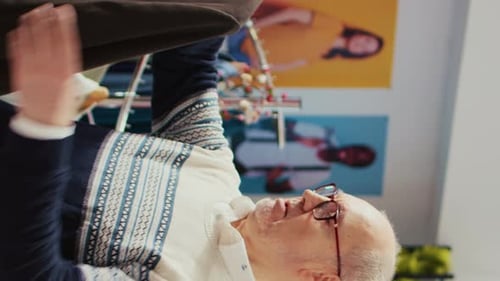 Vertical Video Elderly Client in Xmas Decorated Store