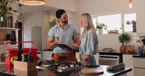 Clipboard, repair and handyman with woman in kitchen for maintenance, installation service