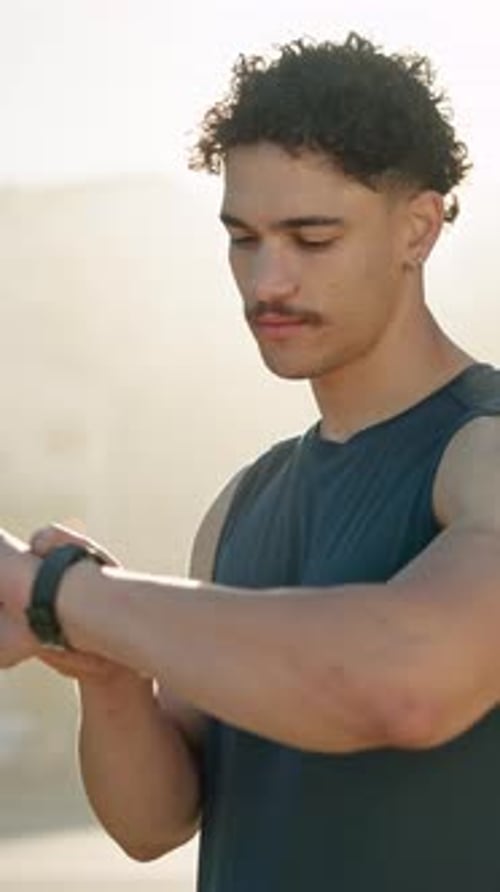 Man, smart watch and runner in city, exercise and click with timer, monitor