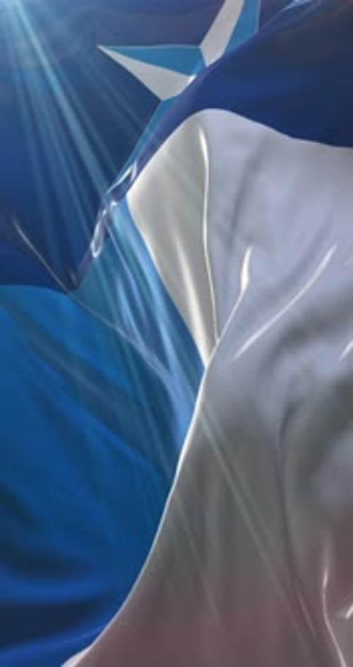 Somalia Flag Waving in Realistic Fabric with Sunbeams
