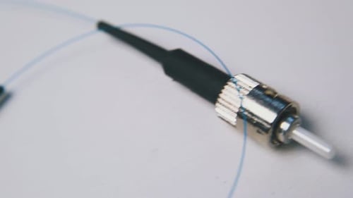 New Thin Fiber Optic Connecting Wire on White Background