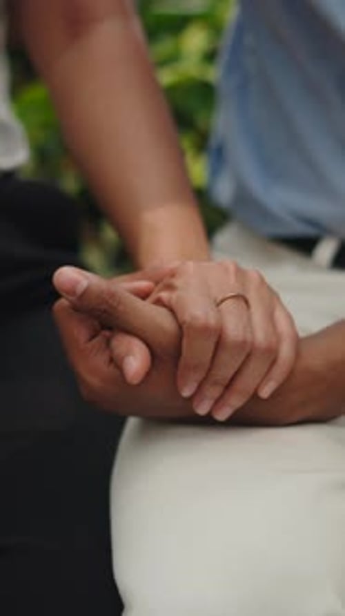 Close Up of Loving Couple Holding Hands