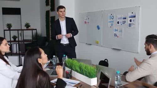 Business Presentation in Modern Corporate Office Setting